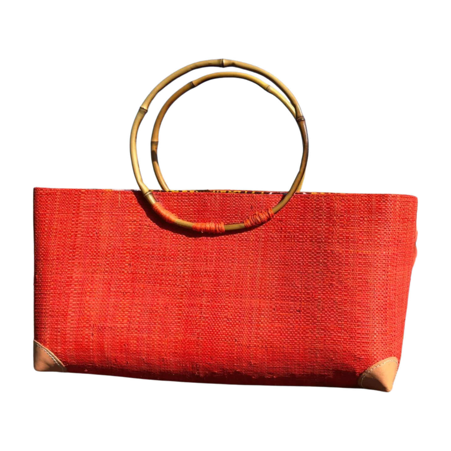 made of raffia with bamboo handles