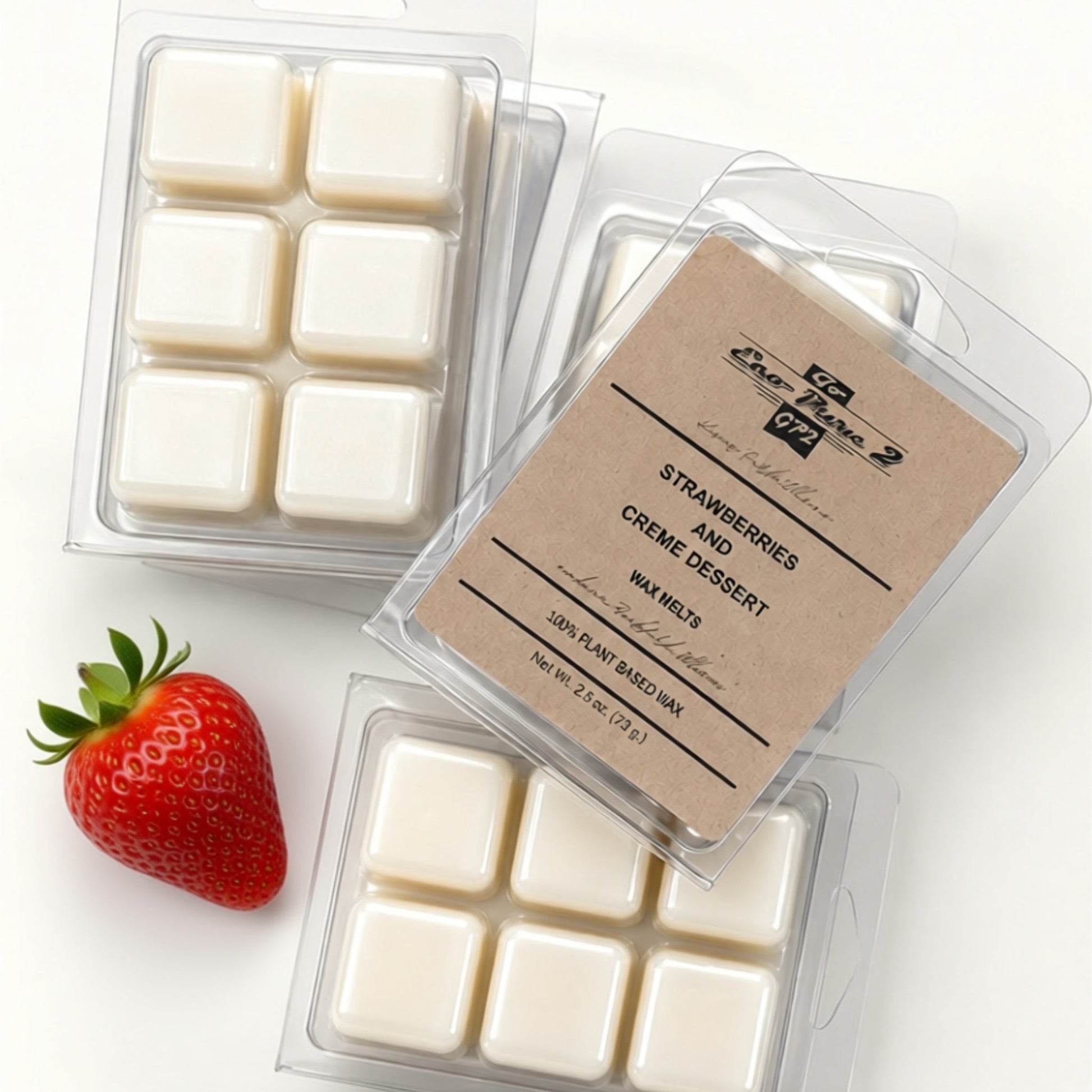 Wax melts in packaging with a strawberry on a white background